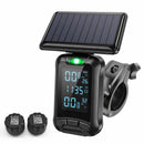 Moman MK2 solar powered TPMS consists of two sensors, a solar panel, and a display.
