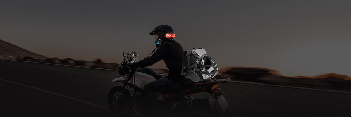Moman motorcycle riding system includes helmet intercoms, headsets, and accessories like backpacks and brake lights.